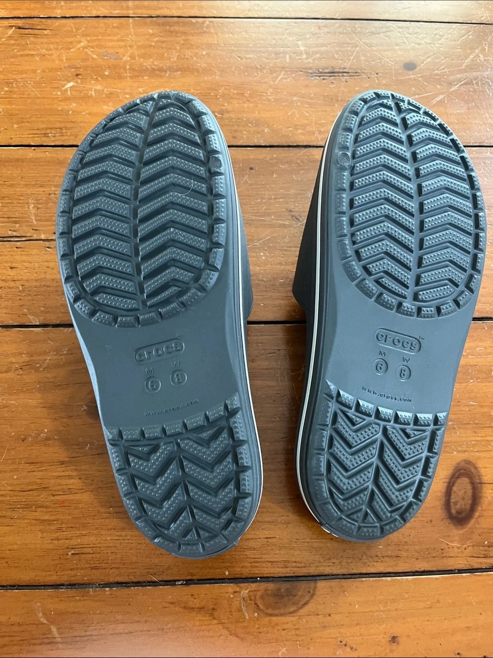 Grey CROCS slides women’s size 8/men’s size 6